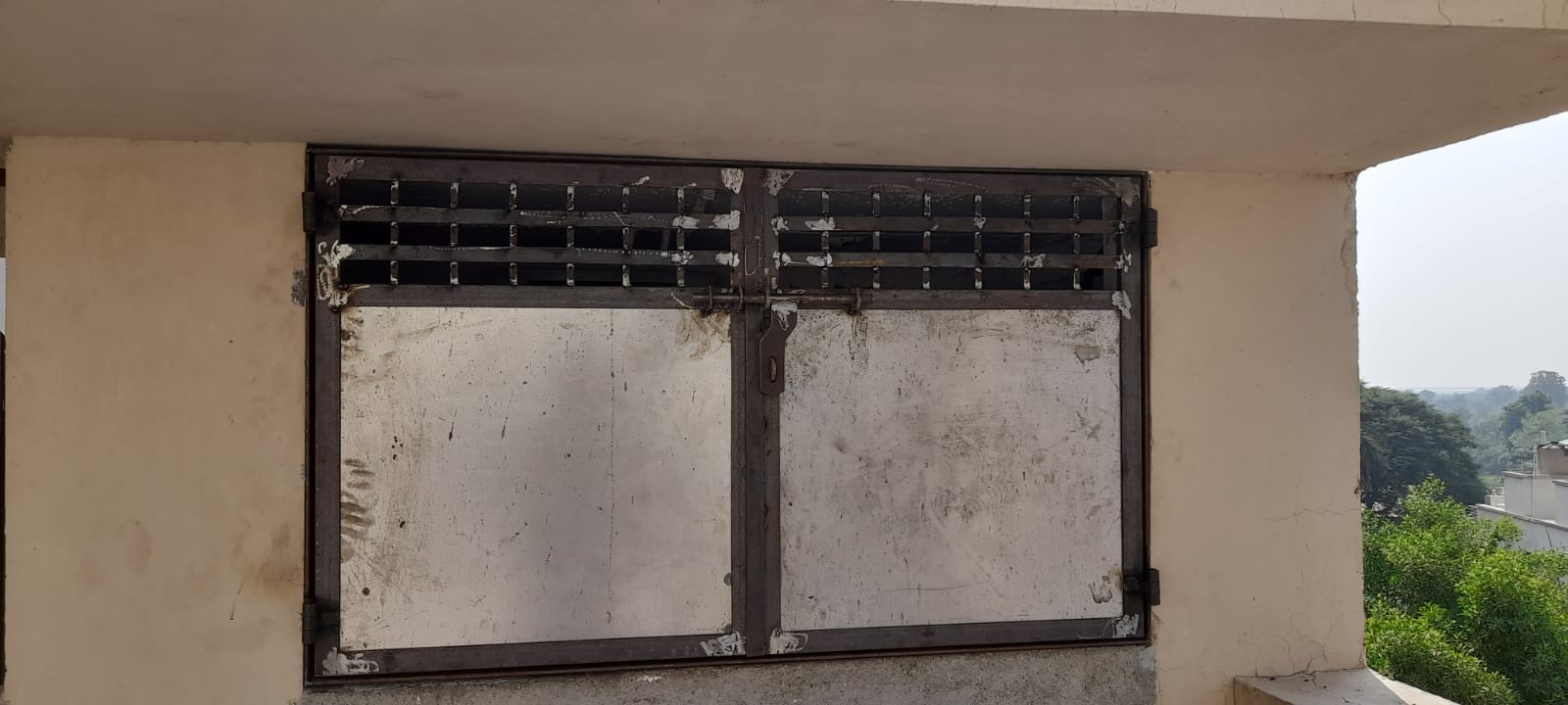 MRL shaft access with safety signage and open panel